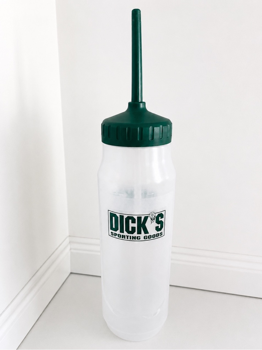 White Bottle with Dark Green Cap